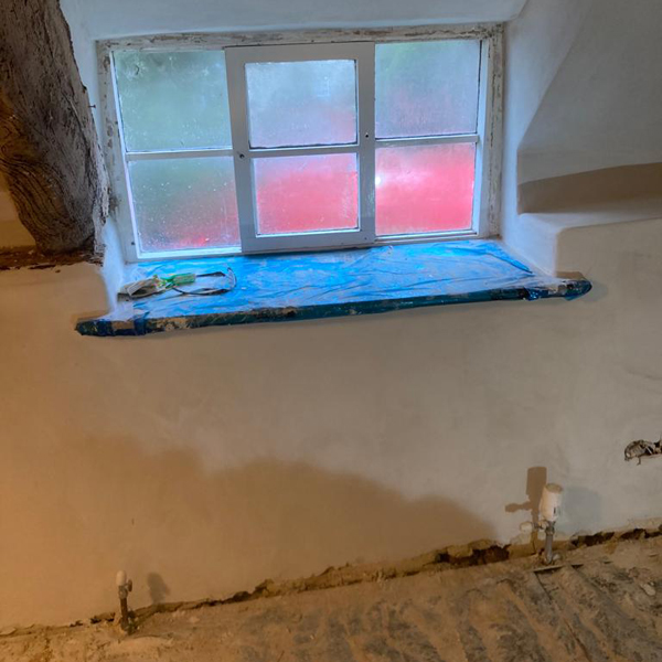 Traditional plastering techniques employed in this build